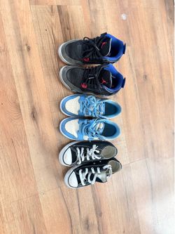 Used kids shoe jordan and dunks size 2 converse size 1 all for $30