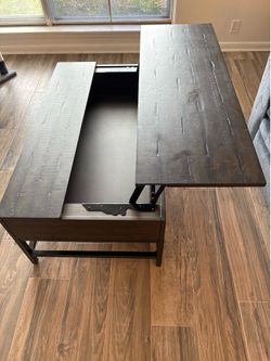 Wood coffee table with hidden storage
