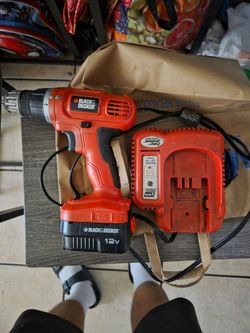 Black n decker drill battery n charger $20