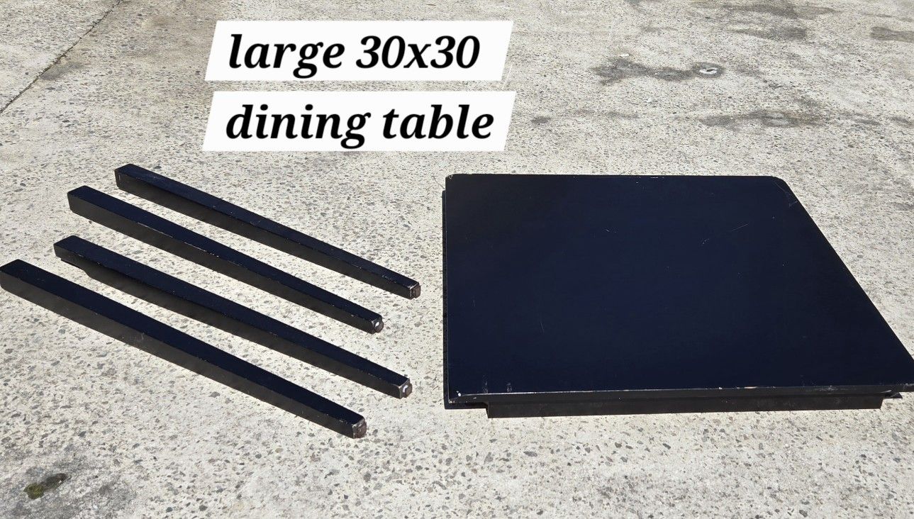 LARGE BLK WOODEN 4 PERSON DINING TABLE