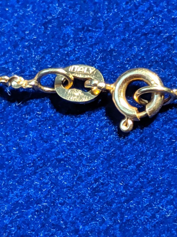 14 k bracelet with flower pendant/ charm
