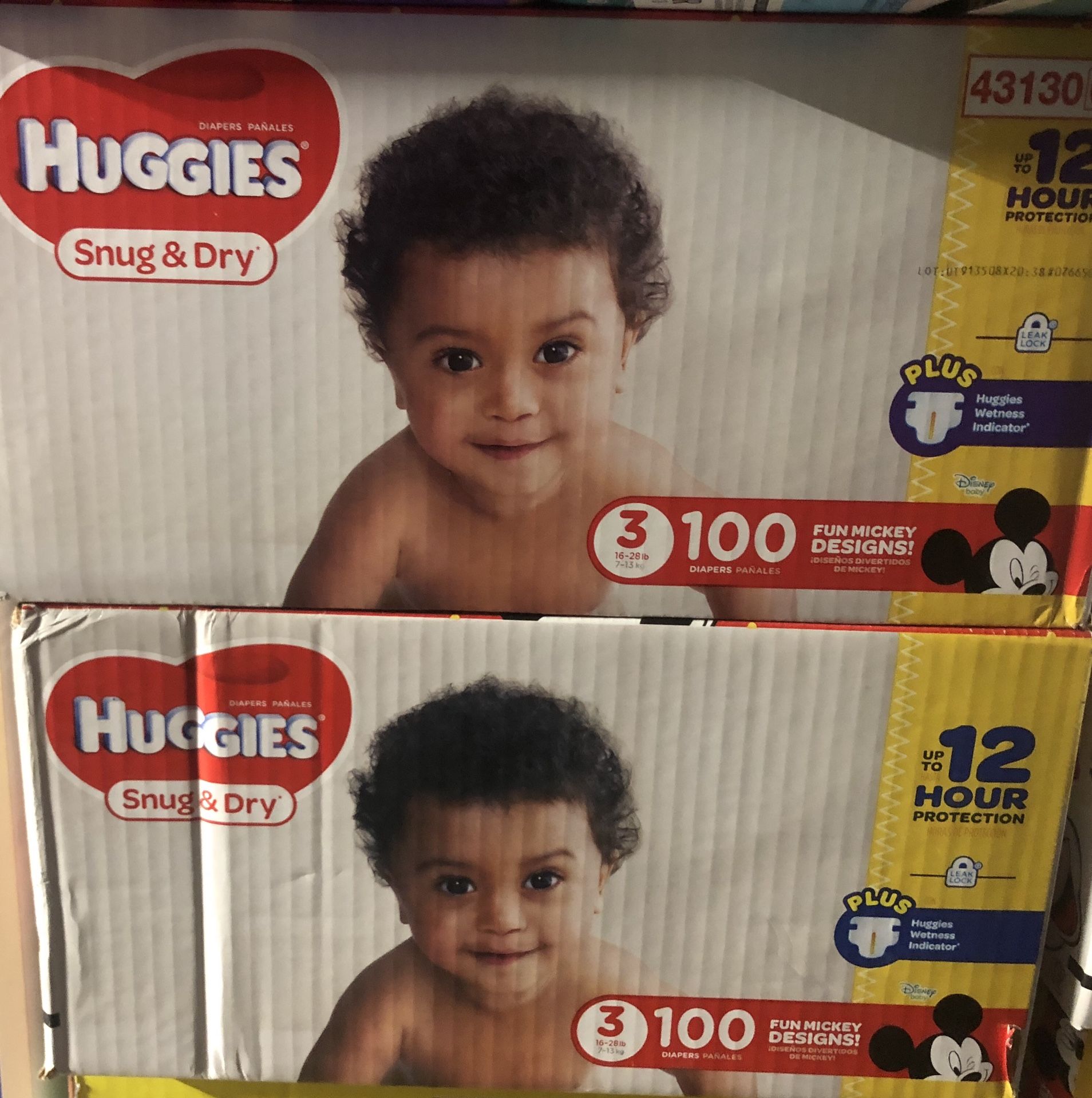 Huggies snug and dry size 3- 2 100 ct boxes