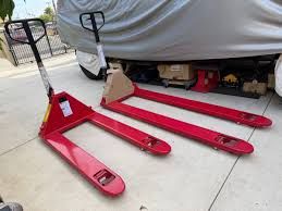 Six n eight ft long Pallet jacks $(contact info removed) each