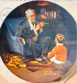 This is a 1982 Edwin M. Knowles porcelain collector plate titled "The Tycoon" from the Rockwell Heritage Collection, featuring a man smoking a pipe wh