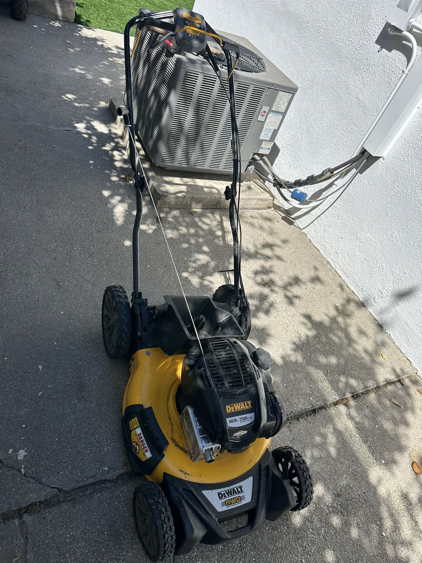New dewalt lawnmower with Briggs & Stratton motor.#12AVP2R3739 model. RWD. No bag. $250 firm. Try before you buy. Pick up only.