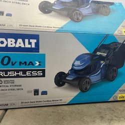 Blue Lawn Mower In Brand New Condition 