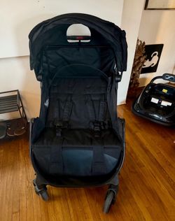 Double Stroller w/ Adjustable Canopy