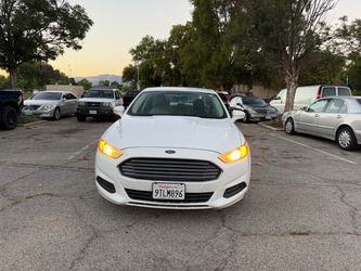 2014 Ford Fusion Hybrid – 136K Miles