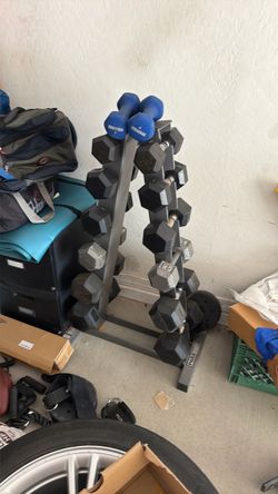 Rack of dumbbells with dumbbells included