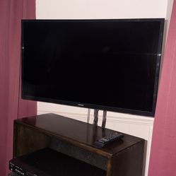 32" Samsung Smart tv, It also has a stand for it & the mount on the wall so you can swivel it