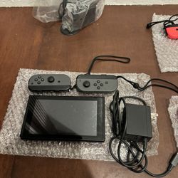 Brand New Blacked Out Nintendo Switch With Wrist Band 