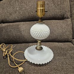 Vintage milk glass table lamp. No shade.