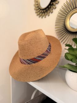 Cream hat with colored ribbon