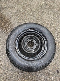 Michelin Defender LTX M/S 275/65R18 Tire with Steel Rim