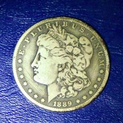 1889 “O” Morgan Silver Dollar w cameo toning