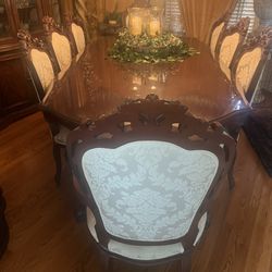 Beautiful large formal dining room table and chairs. 