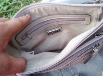 Rosetta tan hand purse