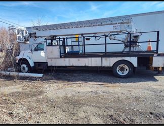 White Bucket Truck with Aerial Lift