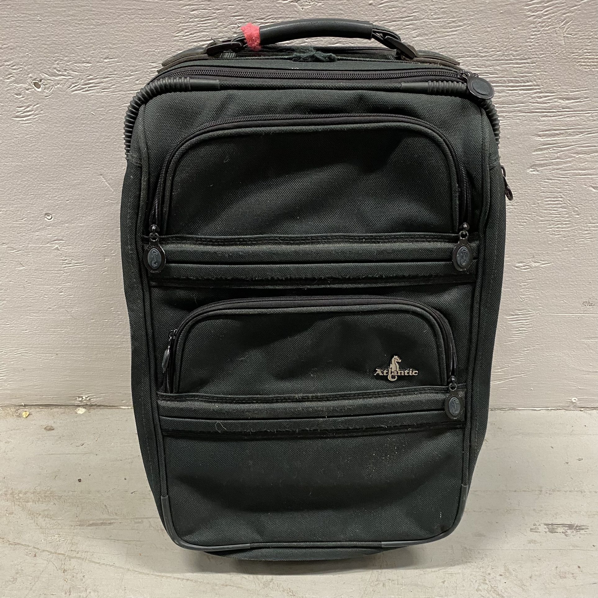 ATLANTIC Dark Green 2-Wheel Rolling Carry-On Luggage Suitcase Travel Bag Great pre-owned condition. The wheels, zippers, retractible handle and the t
