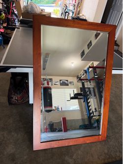 Large wood framed mirror