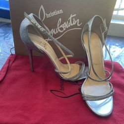 Christian Louboutin (red bottoms )