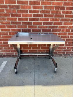 Stainless Steel work bench / table on casters w/ Electrical wiring channels