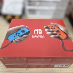 Nintendo Switch with Neon Blue and Neon Red Joy-Con