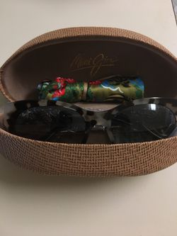 Brand new Maui Jim 24k white gold monstera. Never worn