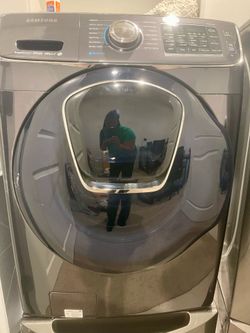 Samsung front load washer and a GE front load dryer with drawer