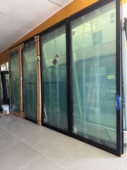 Black aluminum Anderson multi sliding glass doors 12’x8’
