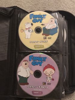 Binder Full Of Dvds Movies And Tv Shows And A Few Music CDs 