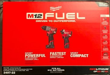 Mikwaukee M12 Fuel Impact and Hammer Drill c9mbo with 2 batteries, charger and bag . Brand new