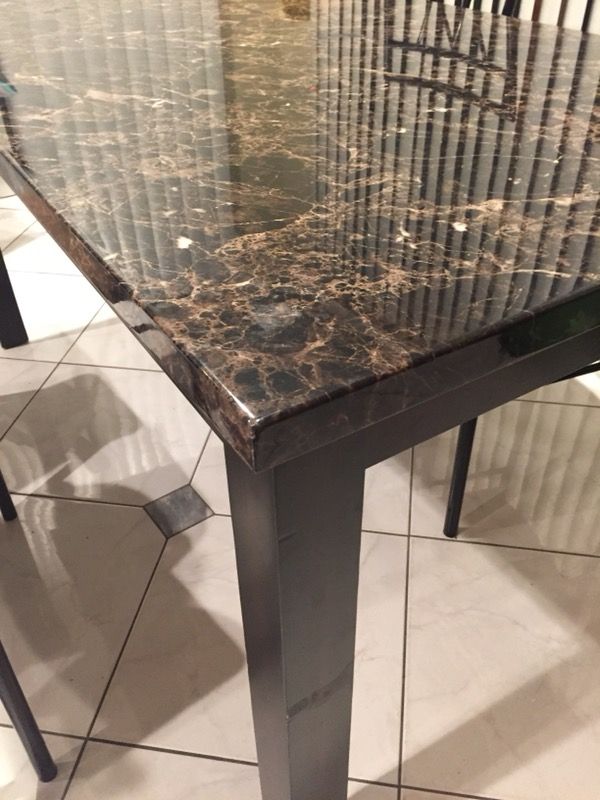 Dining table with 4 chairs.