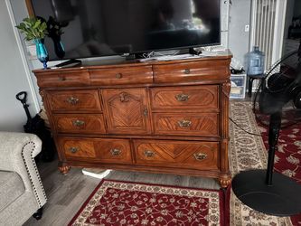 Large Wood Dresser with Ornate Carved Details