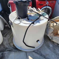 FISH POND AND HUGE PLASTIC CONTEINER 