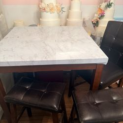 Bar height table and stools