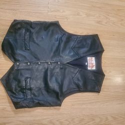 Black LEATHER  VEST..SIZE MED MENS ADULT..SNAP FRONT..GREAT CONDITION!
