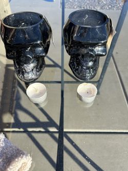 Two Glass Black Skull Candle Holders With Candles