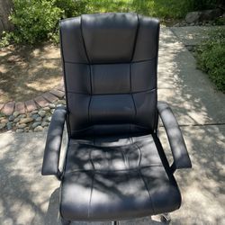 Adjustable Office Chair Black Rolls And Spins