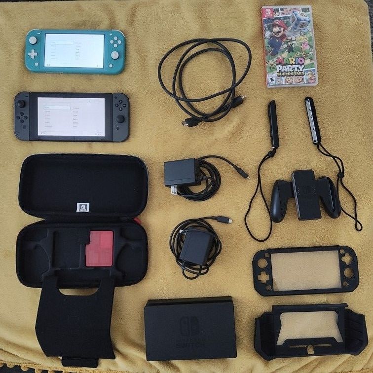 Switch 1 With Carrier, Joycons, Dock, And Power Supply. Switch 1 Lite With Protective Screen And Hard case. Mario Party Superstars Included.