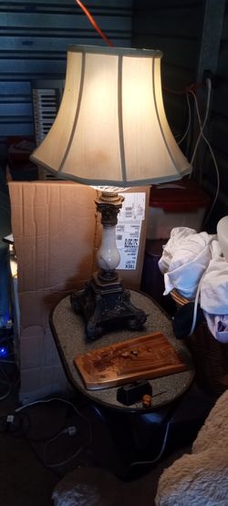 Ancient Lamp.   I Can Find No Markings.  The Marble Is Real And Whatever Metal It's Made From It's Solid.  Weighs 40 Or 50 Lbs.  Definitely A Quality 