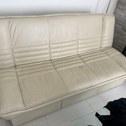 Leather sofa bed with storage drawers