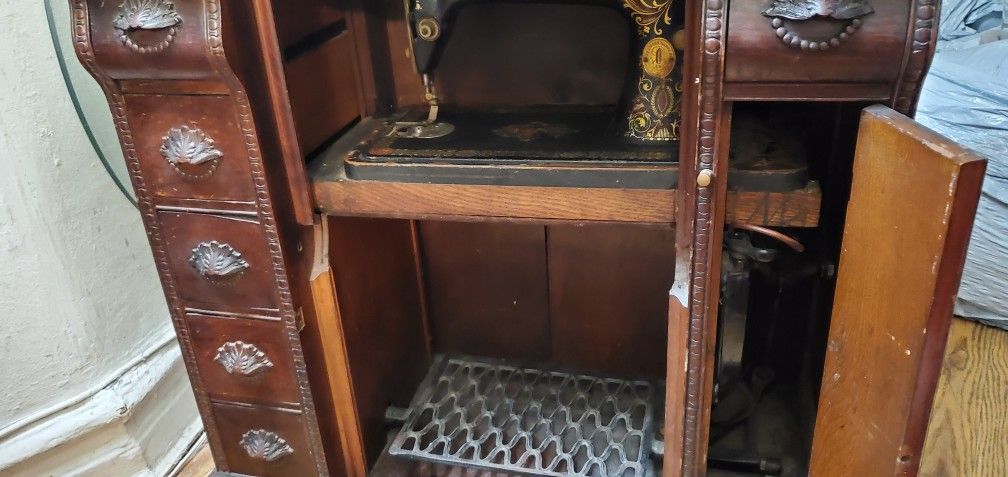 vintage singer mechanical machine.
