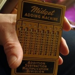 1900's Midget Tin Adding, multiication, subtraction, and division machine