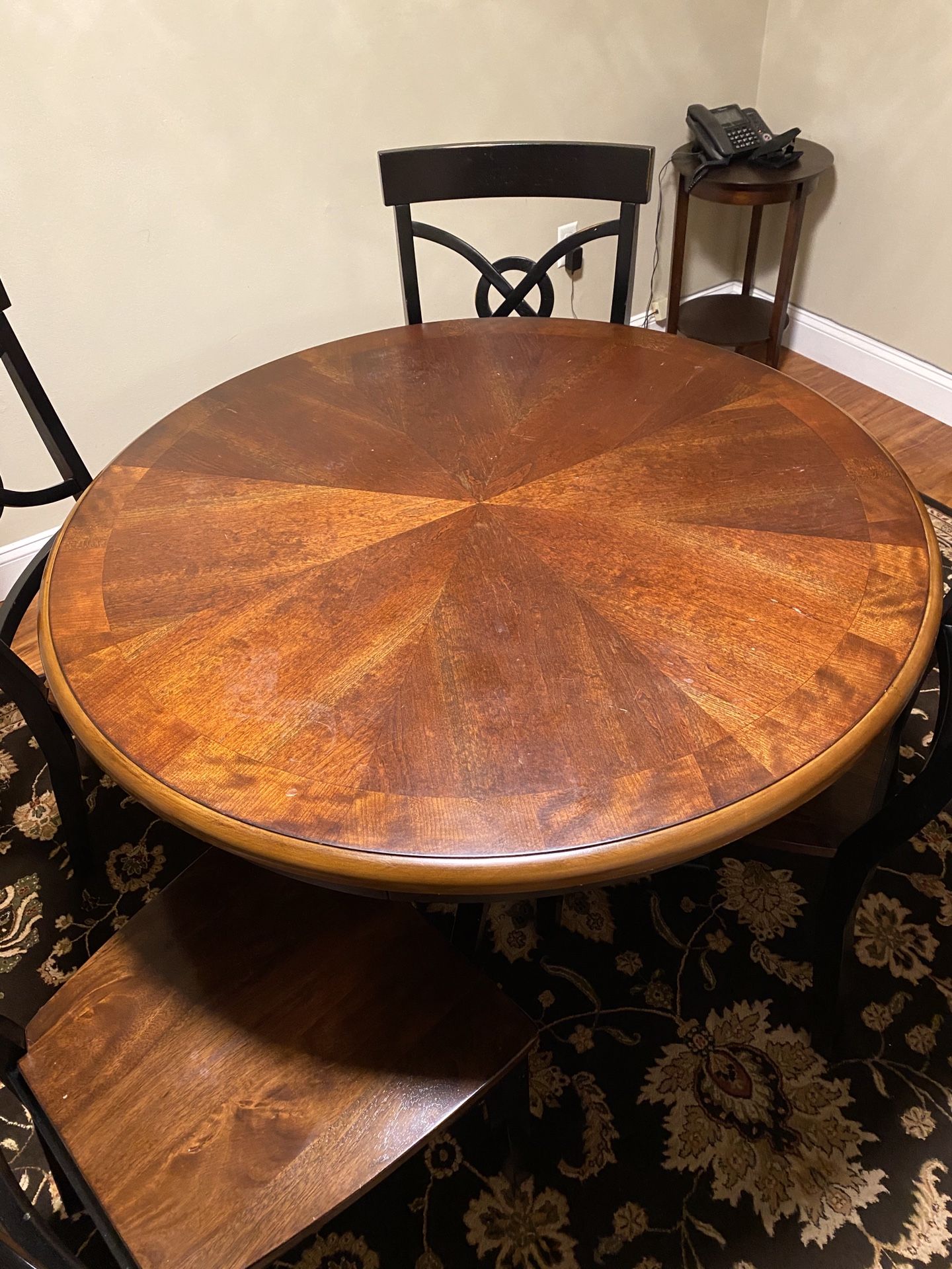 Round solid wood dining table with 4 chairs