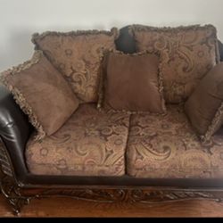 Brown Cloth and Leather  Couch And Loveseat 