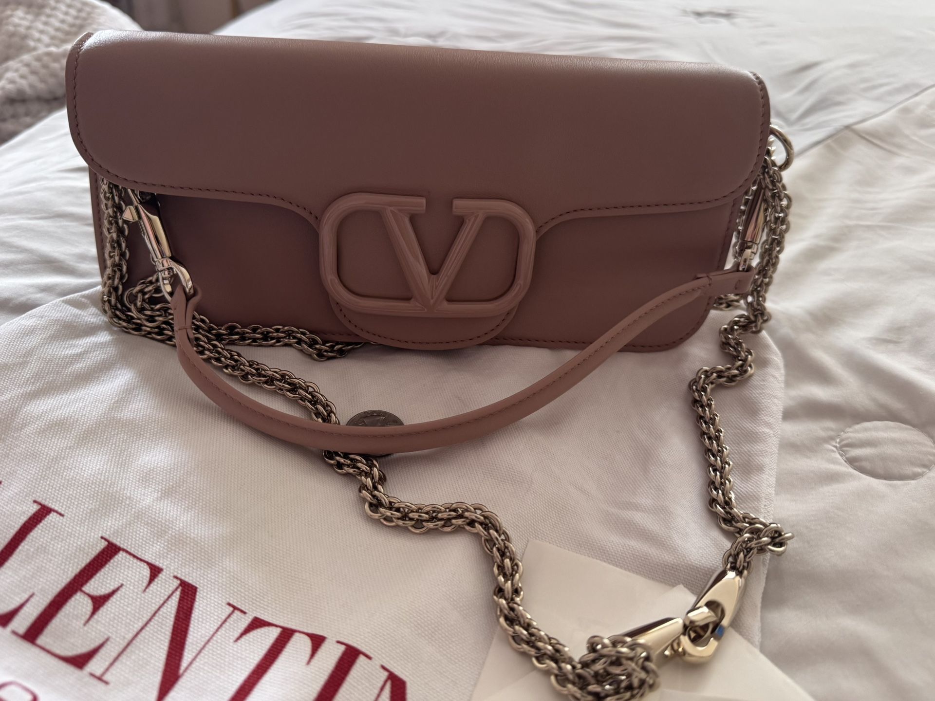Valentino garavani Pink Clutch With Modern Design