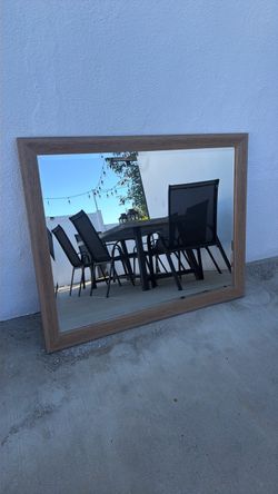 Mirror with wood frame