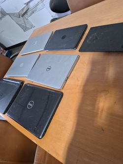 7 laptops 3)HP.         3)Dell.   1)Lenovo  working order not locked