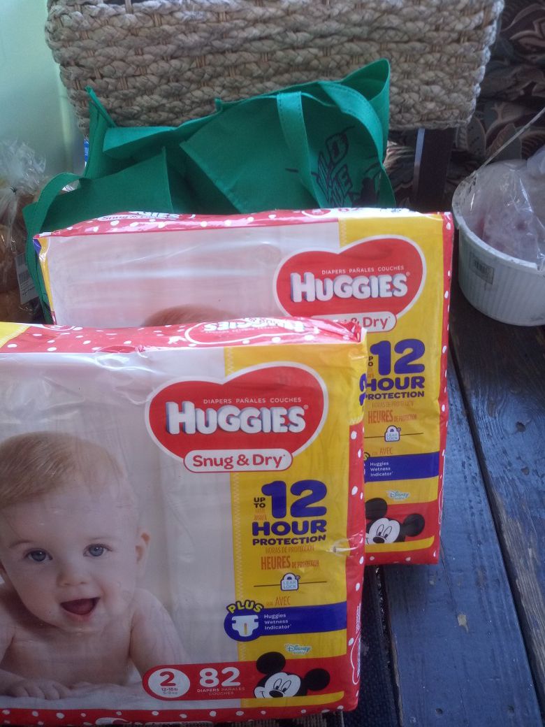 Huggies size 2 ....12 hr protection snug and dry diapers